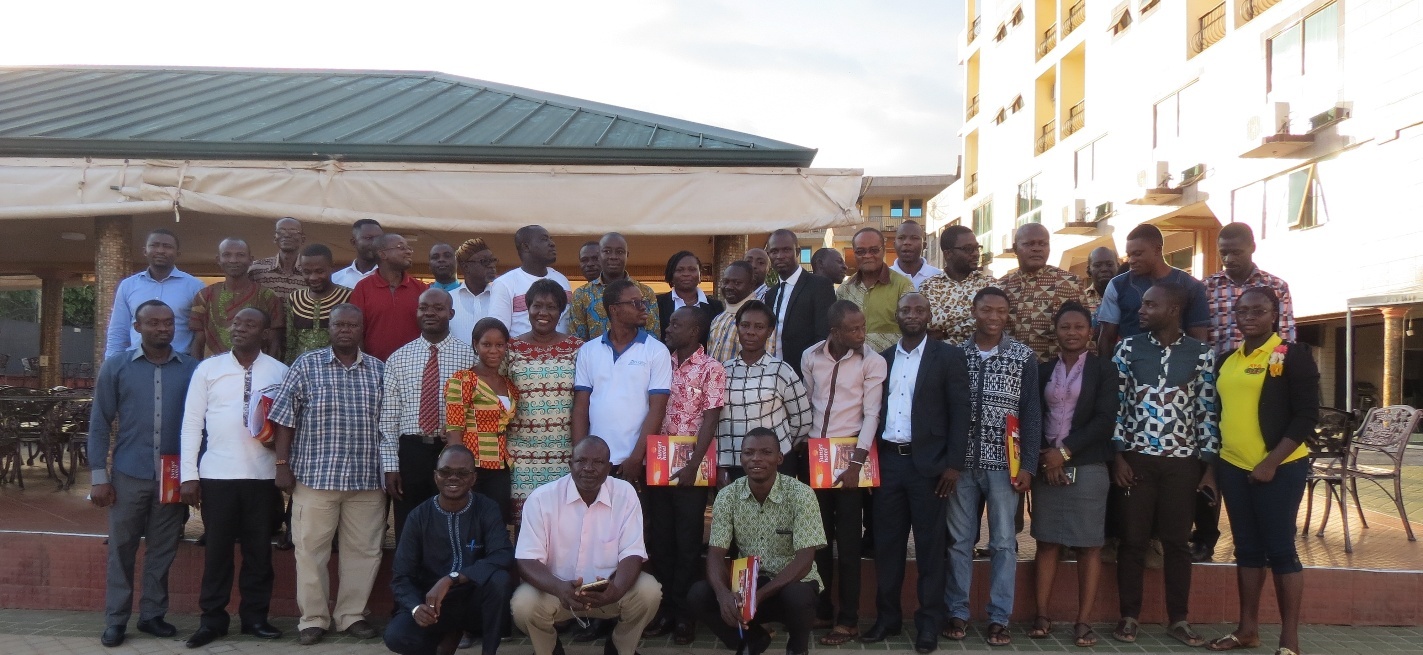 Root Capital staff with members of a focus group in Kumasi, Ghana