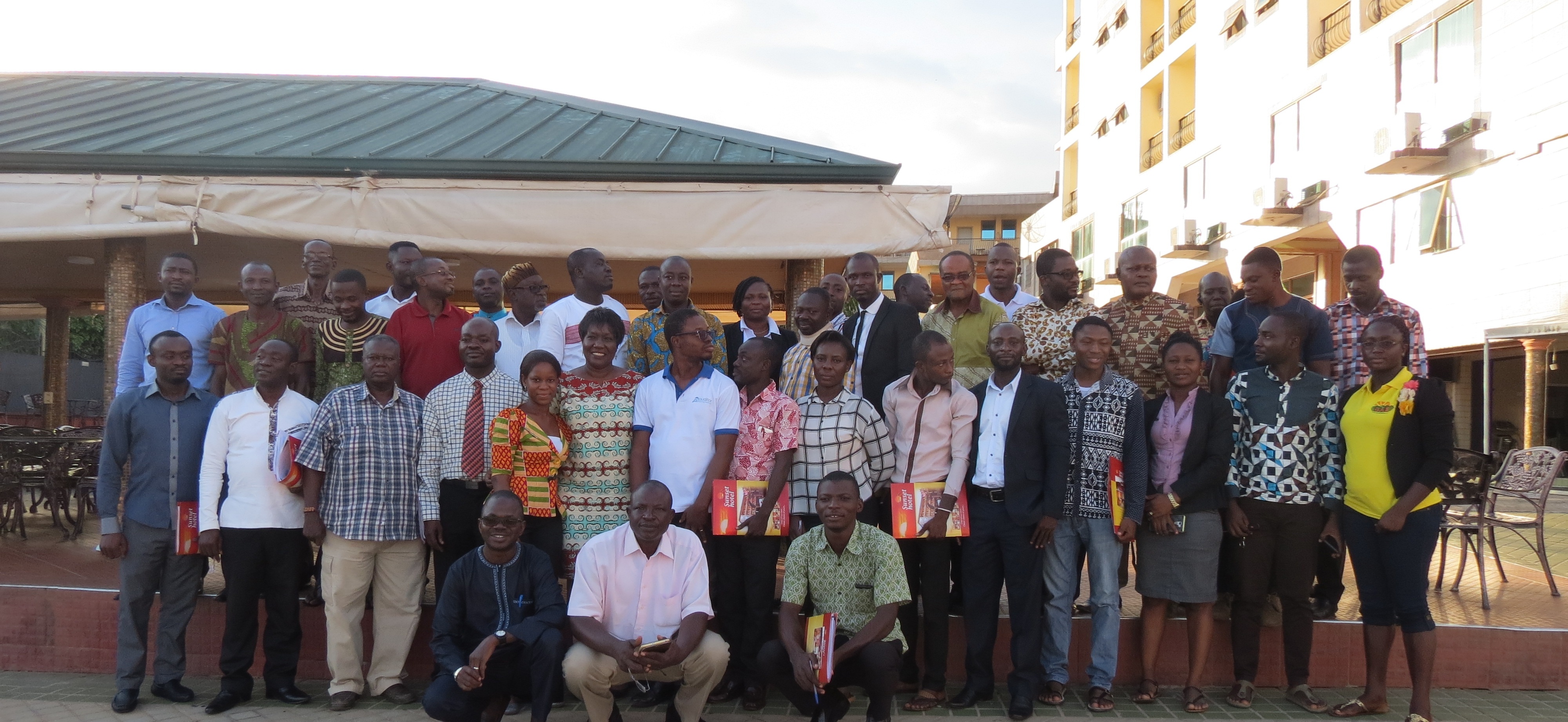 Root Capital staff with members of a focus group from Kumasi, Ghana.