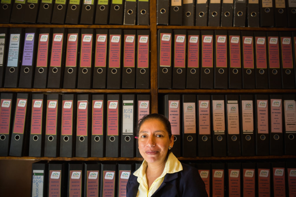 Yolanda Argentina Romero Lacio, has worked in RAOS for five years in the accounting department, she is also a coffee producer herself. She administers loans to the coop members that are made possible through Root Capital, she says 